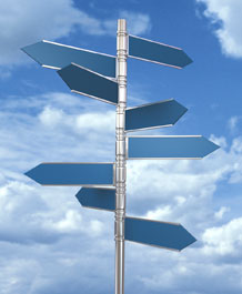 Image of a signpost against a cloudy sky