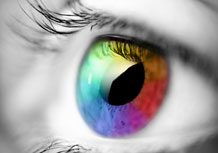 Close up image of an eye with a multi-coloured iris.